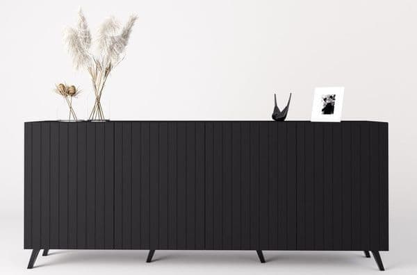 Amos Mann Furniture Atlantis matte black wide 4 door sideboard in a modern living room setting