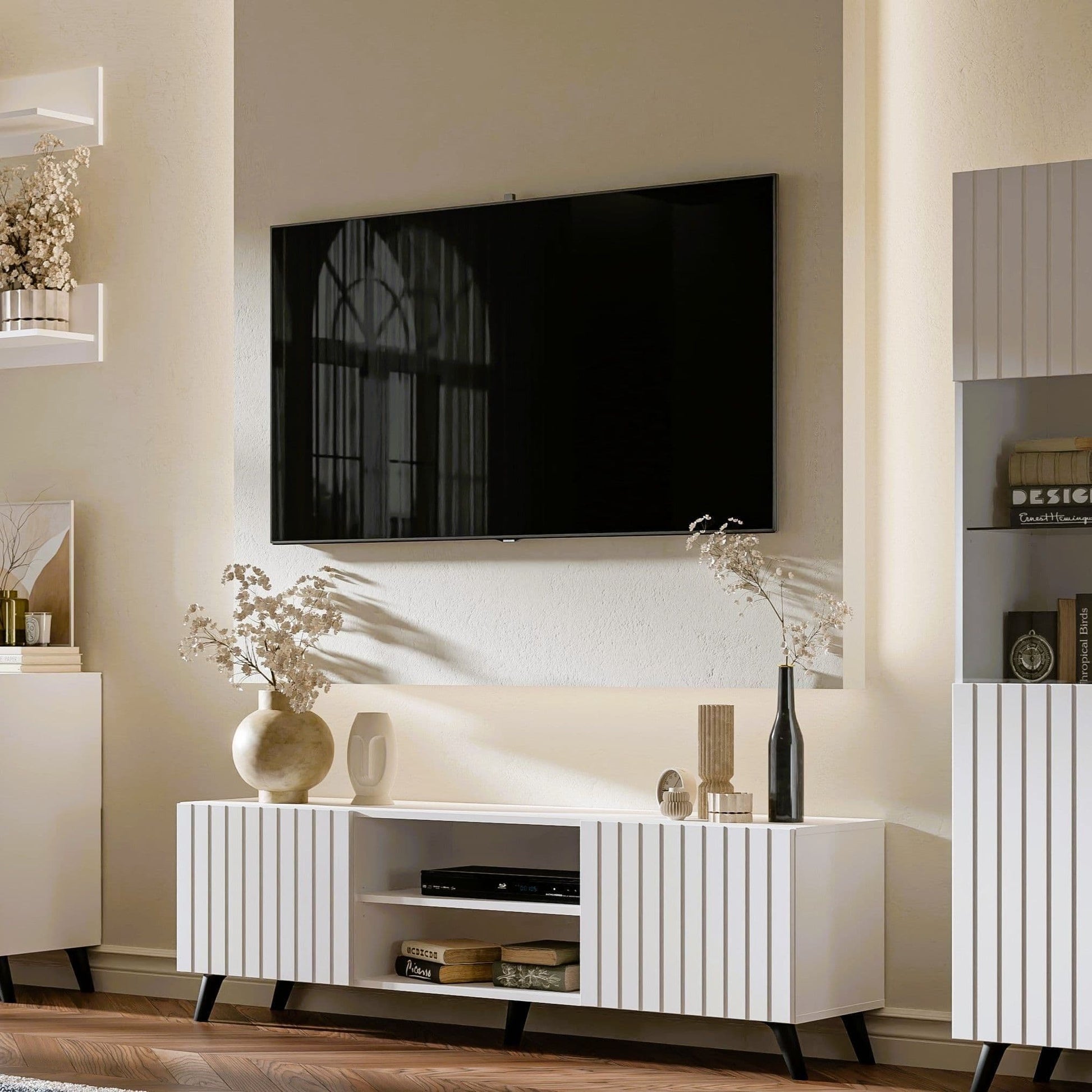 Amos Mann Furniture Atlantis matte white TV cabinet in a modern living room setting