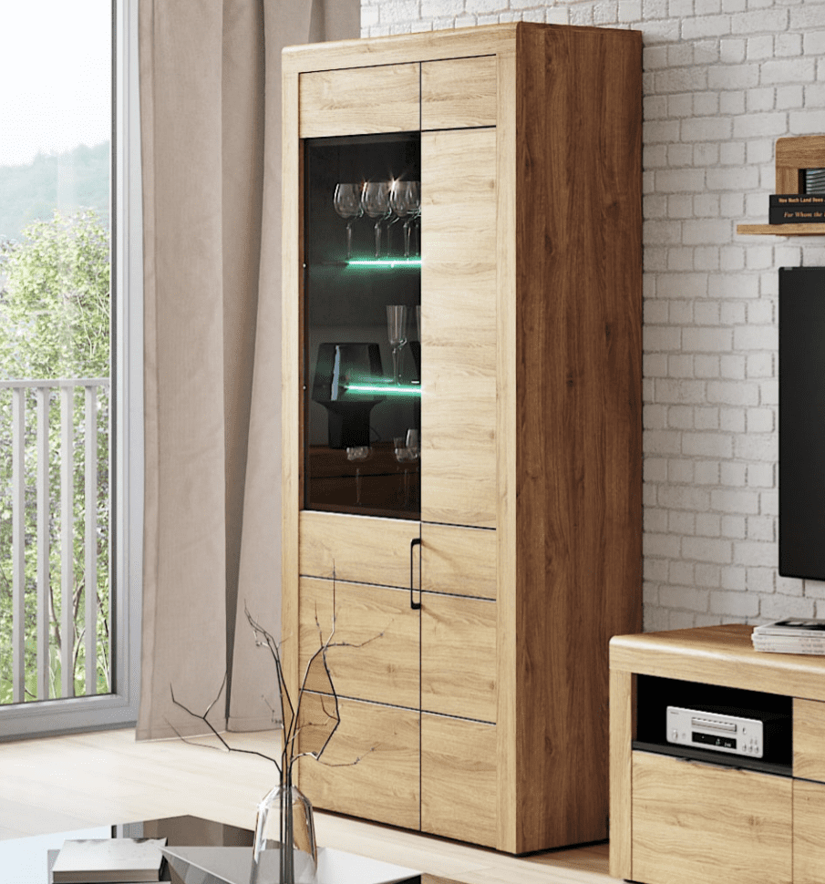 Amos Mann Furniture Camar oak effect large 2 door display cabinet with LED lights in a modern living room setting