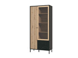 Amos Mann Furniture Clifton slatted oak and black tall display cabinet in a modern living room setting