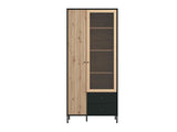 Amos Mann Furniture Clifton slatted oak and black tall display cabinet in a modern living room setting