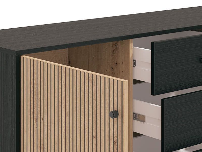 Amos Mann Furniture Clifton oak and black sideboard in a contemporary dining room with natural lighting