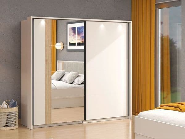 Amos Mann Furniture Granada cashmere and oak effect sliding mirrored wardrobe in a modern bedroom setting