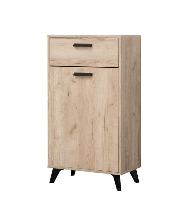 Amos Mann Furniture Kenzo grey oak sideboard with black legs in a modern living room setting