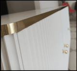 	Amos Mann Furniture Maison white and gold 3 door sideboard in a modern dining room setting