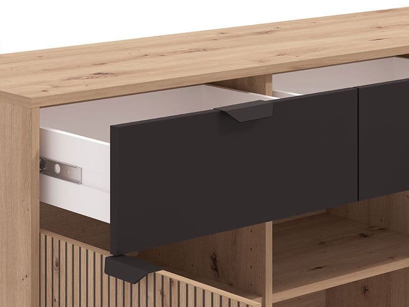 Amos Mann Furniture Martinique artisan oak and black sideboard in a modern living room setting