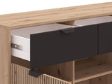 Amos Mann Furniture Martinique artisan oak and black sideboard in a modern living room setting