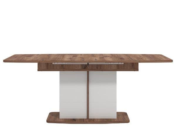 Amos Mann Furniture Merlot white gloss and oak extending dining table in a modern dining room setting