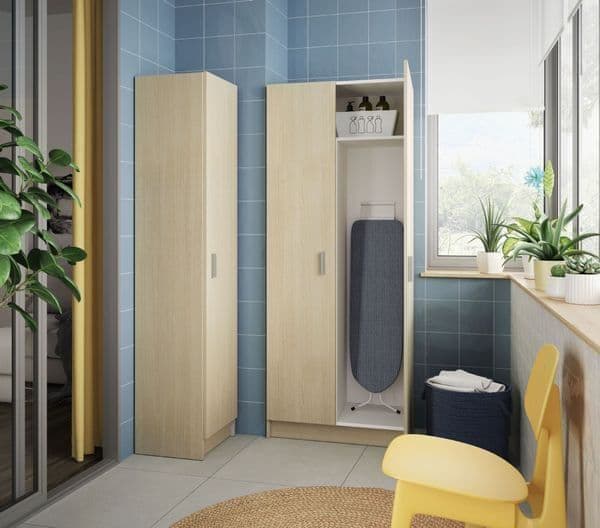 Amos Mann Furniture multi tall oak effect utility cupboard in a modern utility room setting
