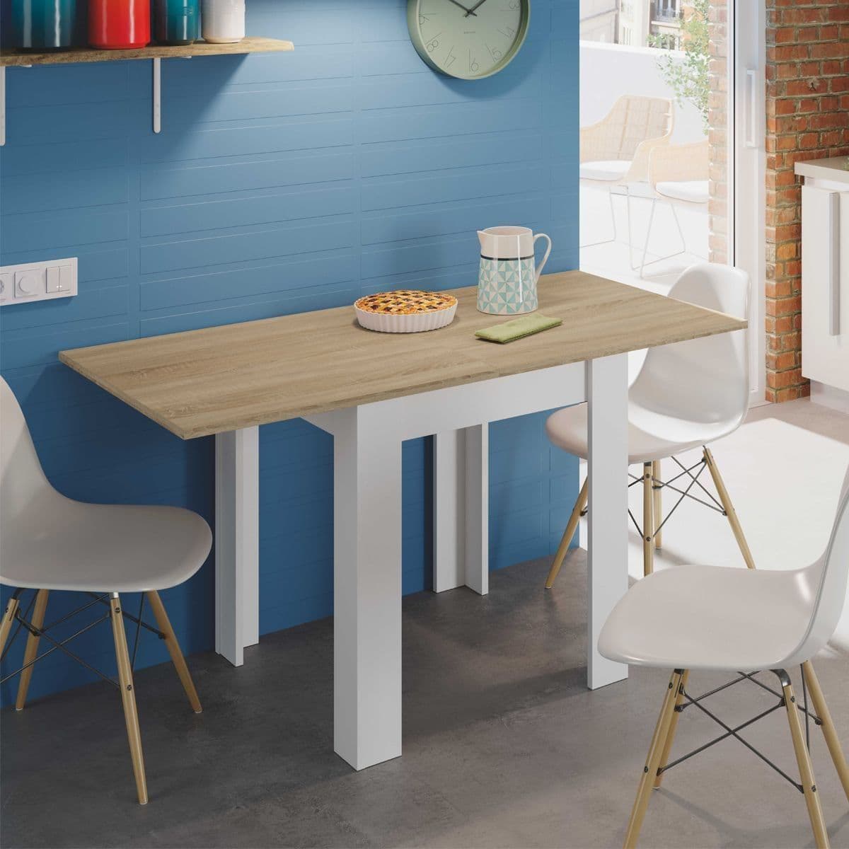 Lifestyle view of Amos Mann Furniture Riccardo white and light oak extending dining table in a stylish contemporary kitchen