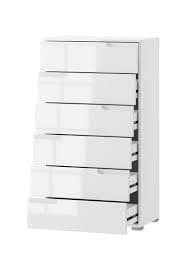 Lifestyle view of Amos Mann Furniture Santino white high gloss tall chest in a stylish contemporary bedroom