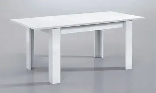 Amos Mann Furniture Tevez white extending dining table in a modern dining room setting