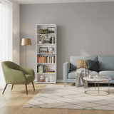 Amos Mann Furniture Thomas white slim tall bookcase in a modern living room setting