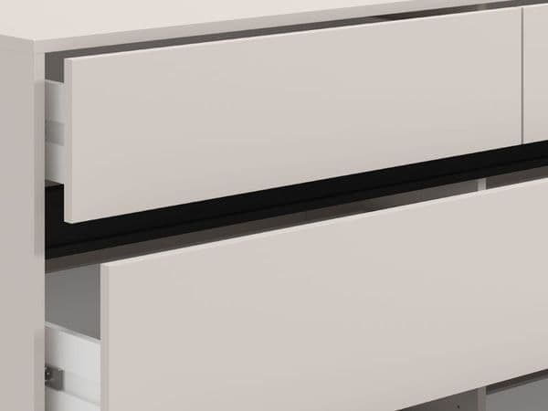 Amos Mann Furniture Zavaro cashmere wide chest of drawers in a modern bedroom setting